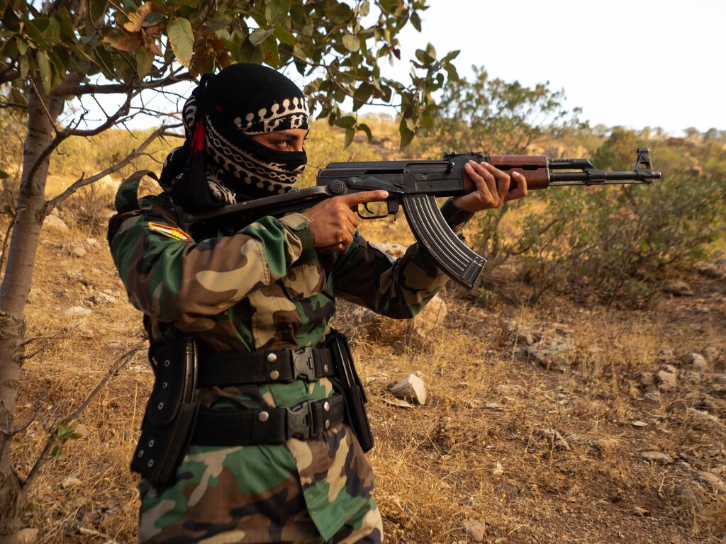 Rezan (19) was smuggled over mountainous terrain for three days with other fugitives. Reaching Iraqi Kurdistan, she joined a group of female Iranian-Kurdish freedom fighters in their remote mountain hideout. Photograph: Lorraine Mallinder