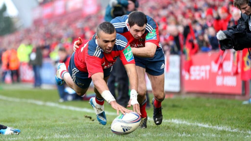 Srumhalf Conor Murray’s feed sends Simon Zebo over for a simple finish in the left corner in yesterday’s Heineken Cup game at Thomond Park. Photograph: Billy Stickland/Inpho