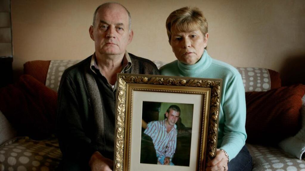 Stephen and Breige Quinn holding a picture of their late son Paul in their home in Cullyhanna, Co Armagh. Photograph: David Sleator/The Irish Times
