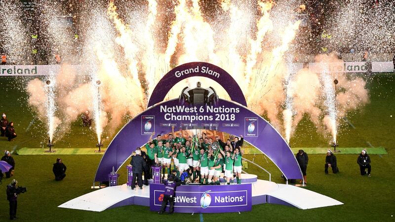 Ireland celebrate with the Six Nations and Triple Crown trophies after carrying out what may go down as the most famous Patrick’s Day parade. Photograph: Shaun Botterill/Getty Images