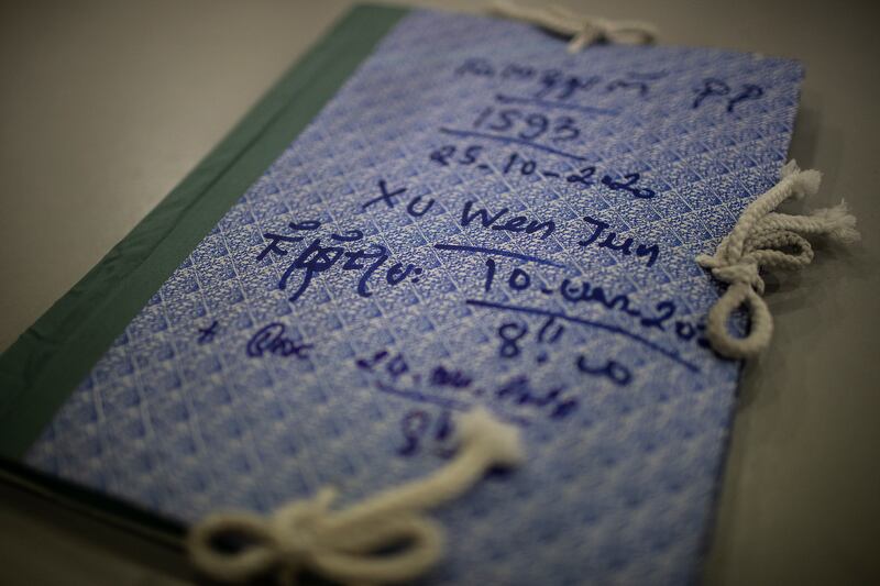 Documents for the court case of Xu Wenjun, who was imprisoned on human trafficking charges for his involvement with surrogacy. Photograph: Nadia Shira Cohen/The New York Times