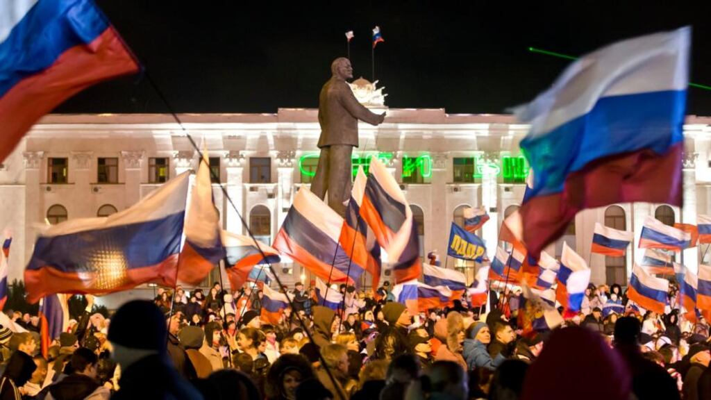 Ethnic Russians celebrate the result of the Crimea referendum in Lenin Square, Simferopol, Ukraine on Sunday, March 16th. Photograph: Vadim Ghirda/AP Photo