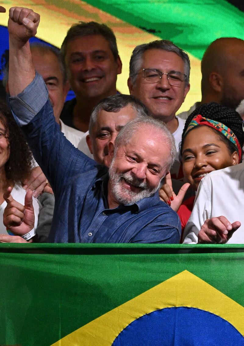 Elected president for the leftist Workers Party (PT) Luiz Inacio Lula da Silva celebrates after winning the presidential run-off election, in Sao Paulo, Brazil on Sunday. Photograph: Nelson Almeida