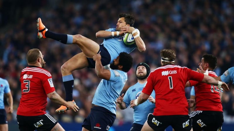 Adam Ashley-Cooper of the Waratahs jumps for a high ball during the Super Rugby Grand Final. Photograph: Matt King/Getty Images