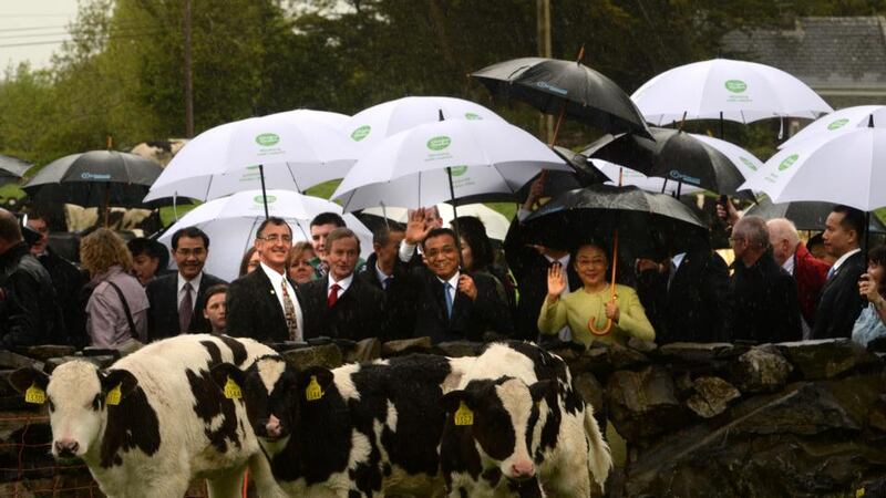 The Chinese premier, Li Keqiang, and his wife, Madam Cheng, with Taoiseach Enda Kenny on Garvey’s farm Gortbrack, Co Mayo. Photograph: Cyril Byrne/The Irish Times