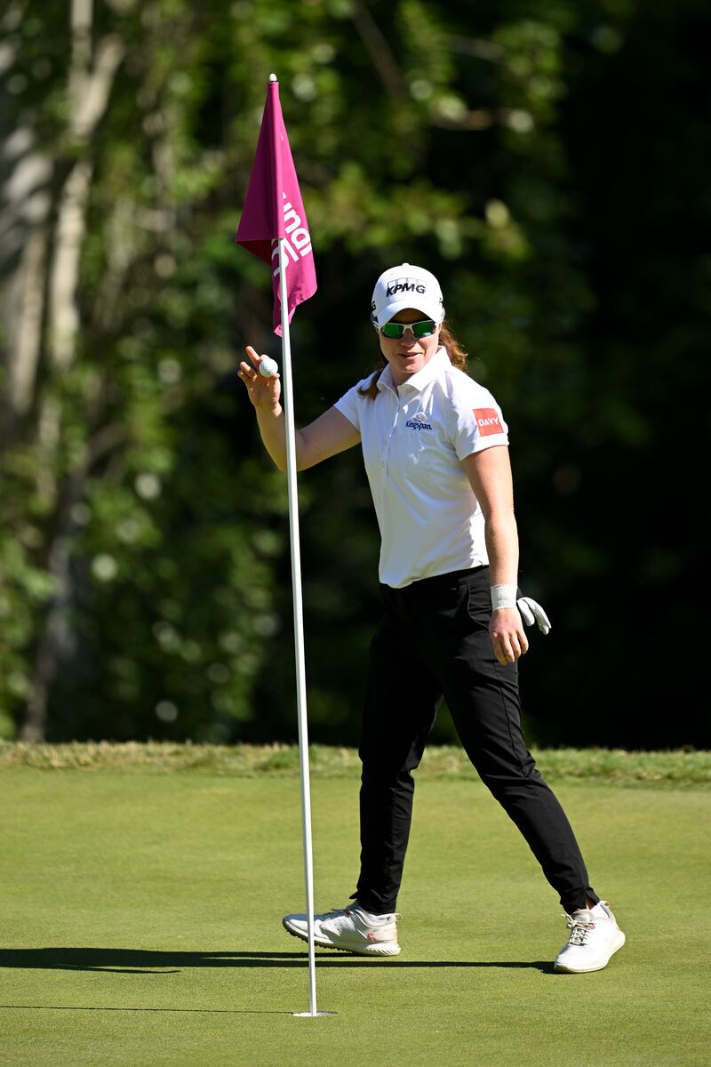 Leona Maguire celebrate hitting a hole-in-one on the second hole. Photograph: Stuart Franklin/Getty Images