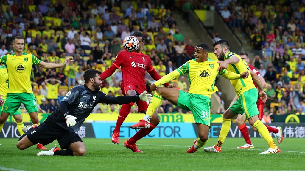 Adam Idah of Norwich City has a shot saved by Alisson of Liverpool during the Premier League match between Norwich City and Liverpool at Carrow Road on August 14th. Photograph: Marc Atkins/Getty Images