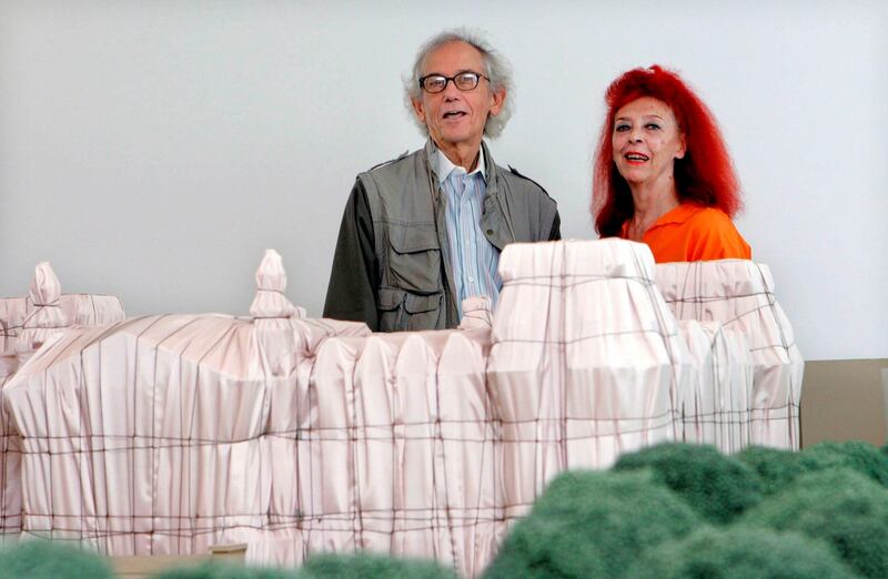 Christo and Jeanne-Claude: the artists with a model of Wrapped Reichstag in 2009. Photograph: Raquel Manzanares/EPA
