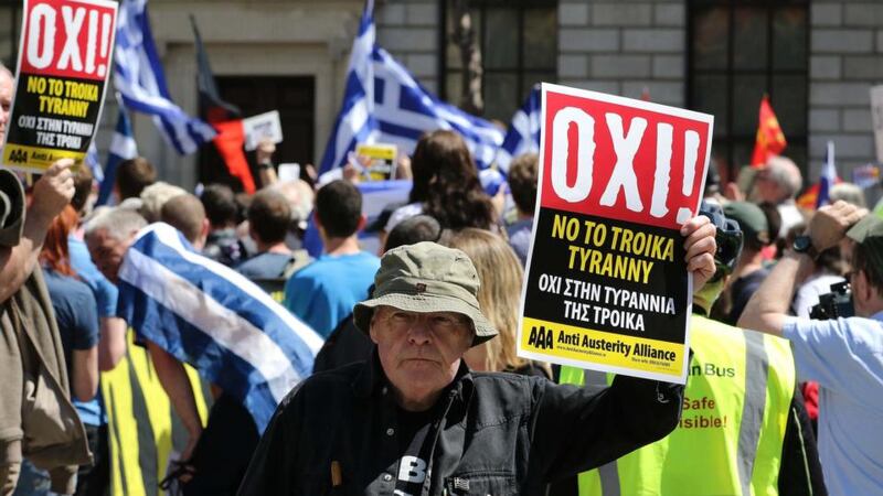 A protestor at the Central Bank in Dublin in support of the Greek solidarity movement. Photograph: Nick Bradshaw