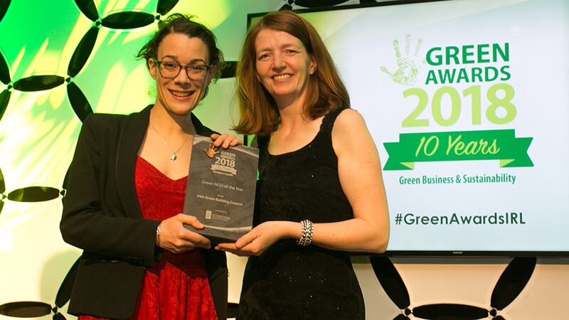 Bernie Kiely, Assistant Principal, in the Waste and Resource Efficiency Division, Department of Communications, Climate Action & Environment, presents the Green NGO of the Year award to Marion Jammet, Irish Green Building Council.