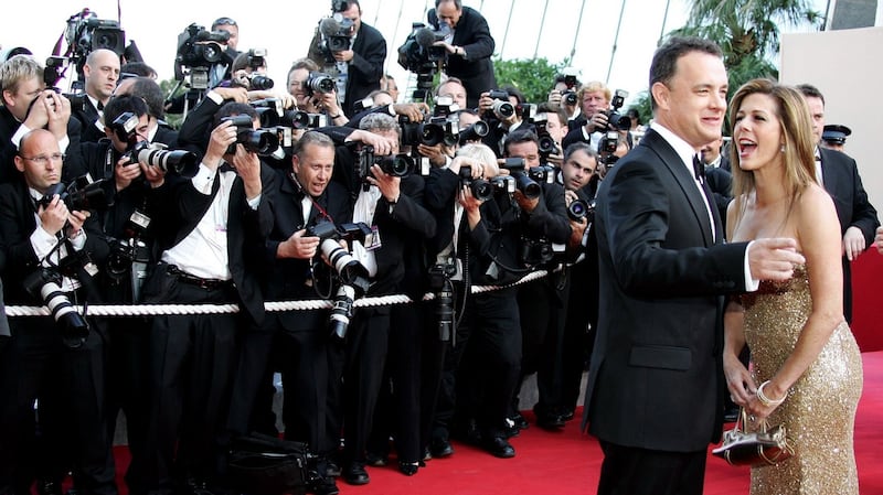 Two-time Oscar winner Tom Hanks and his wife Rita Wilson brave the red carpet in 2004. Photograph: Eric Gaillard/Reuters