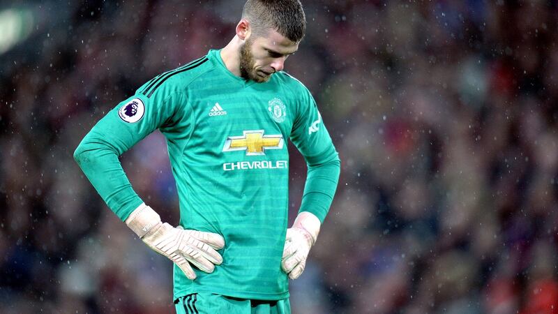 Manchester United’s goalkeeper David De Gea reacts during the defeat at  Liverpool.