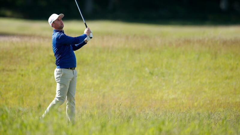 Caldwell hits his approach to the 18th. Photo: Luke Walker/Getty Images