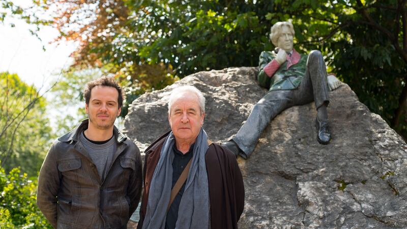 Actor Andrew Scott, left, who performs the script written by writer John Banville, imaging what Oscar Wilde might say to passersby. Photograph: Fáilte Ireland