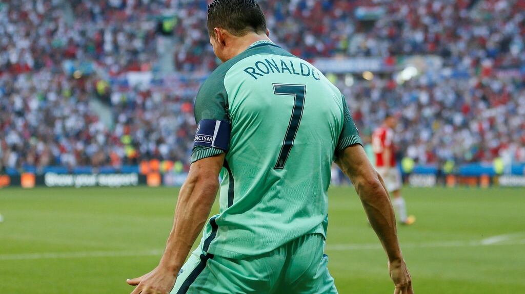 Cristiano Ronaldo celebrates after scoring Portugal’s second goal against Hungary on Wednesday. Photograph: Reuters.