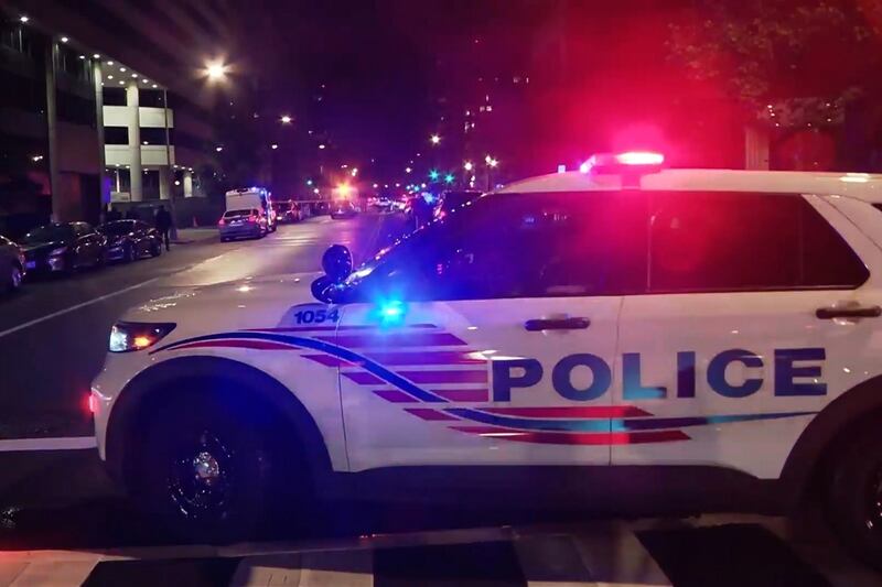 Police at the scene after two staff members of the Israeli embassy in Washington, DC, were shot and killed outside the Capital Jewish Museum. Photograph: WJLA via AP
