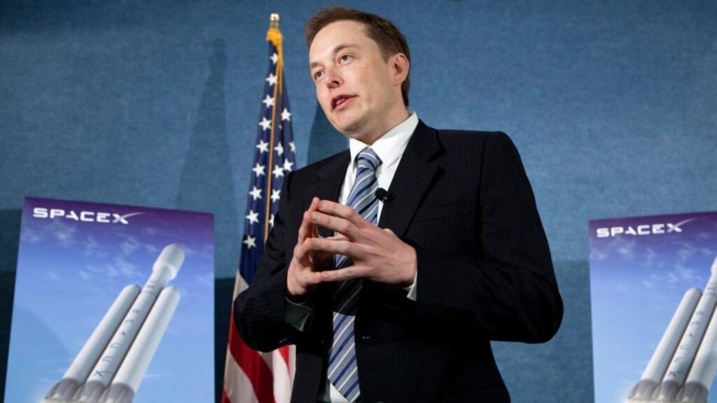 Elon Musk, chief executive officer of Tesla Motors Inc. and Space Exploration Technologies Inc. known as SpaceX, is “going to try and do for satellites what we’ve done for rockets”. ( Photograph: Brendan Hoffman/Bloomberg)