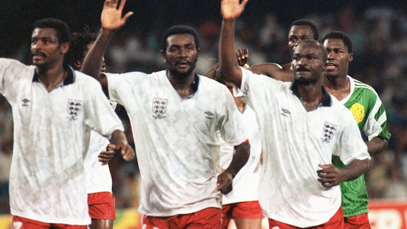 Cameroon’s François Omam Biyick (L), Stephen Tataw and Roger Milla after their 1990 World Cup defeat to England. Photograph: Georges Gobet/AFP