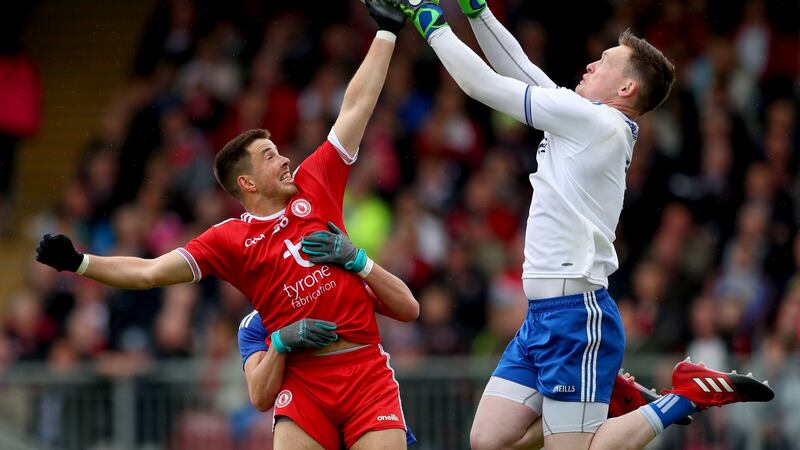 Monaghan’s Rory Beggan claims the ball ahead of Tyrone’s Ronan O’Neill at Healy Park. Photograph: James Crombie/Inpho