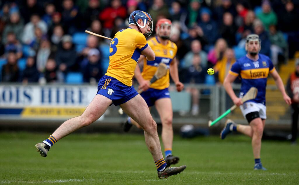 David Fitzgerald fires a stunner to the top corner for Clare’s goal in the first half. Photograph: Ryan Byrne/Inpho