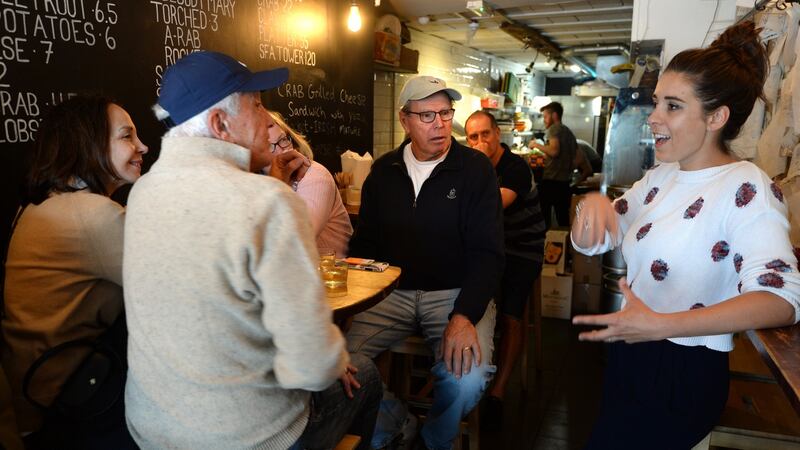 Carole and Roger Freilich and Kathy and Roger Cope, from Florida, and Erica Drum of Fab Food Trails at Klaw in Temple Bar in Dublin. Photograph: Dara Mac Dónaill