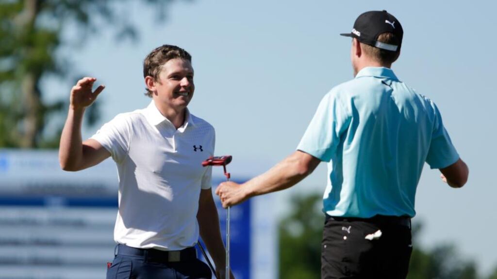 Cameron Smith of Australia and Jonas Blixt of Sweden react after winning a sudden-death playoff against the American duo of Kevin Kisner and Scott Brown at the Zurich Classic at TPC Louisiana. Photograph: Marianna Massey/Getty Images