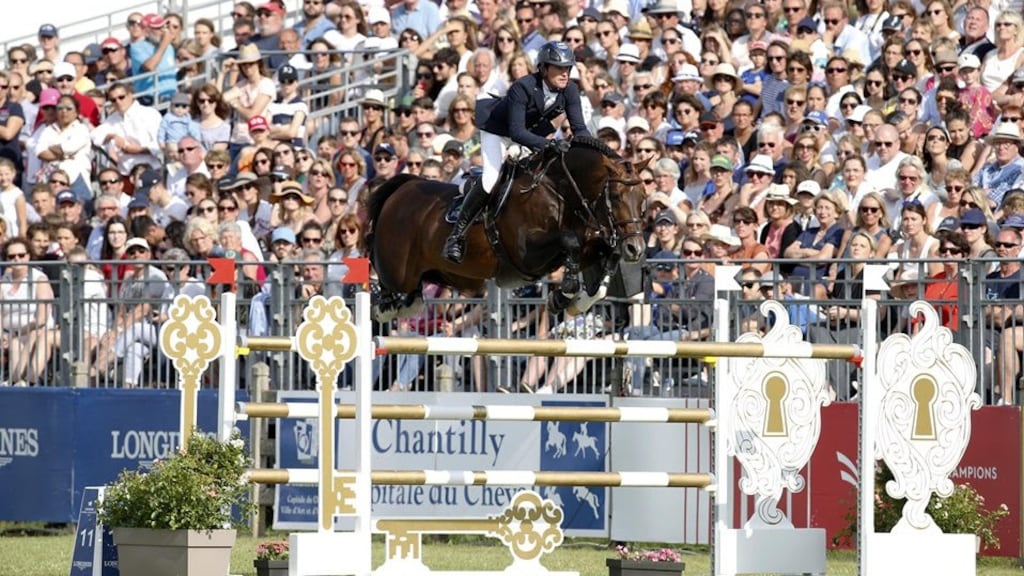 Darragh Kenny and Balou du Reventon on their way to victory in the Chantilly Longines Global Champions Tour Grand Prix. Photograph: Stefano Grasso/LGCT