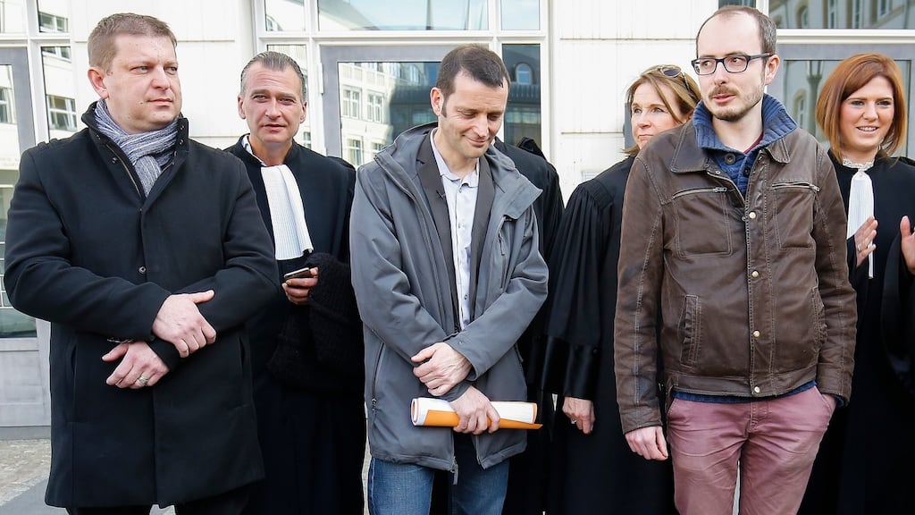 Raphael Halet (left), and Antoine Deltour (right), former employees of PricewaterhouseCoopers, and journalist Edouard Perrin (centre) pictured on Wednesday. Photograph: EPA