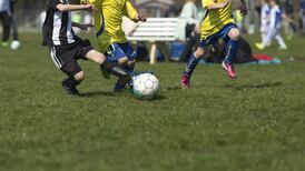 Man died after football kicked in his direction, inquest hears