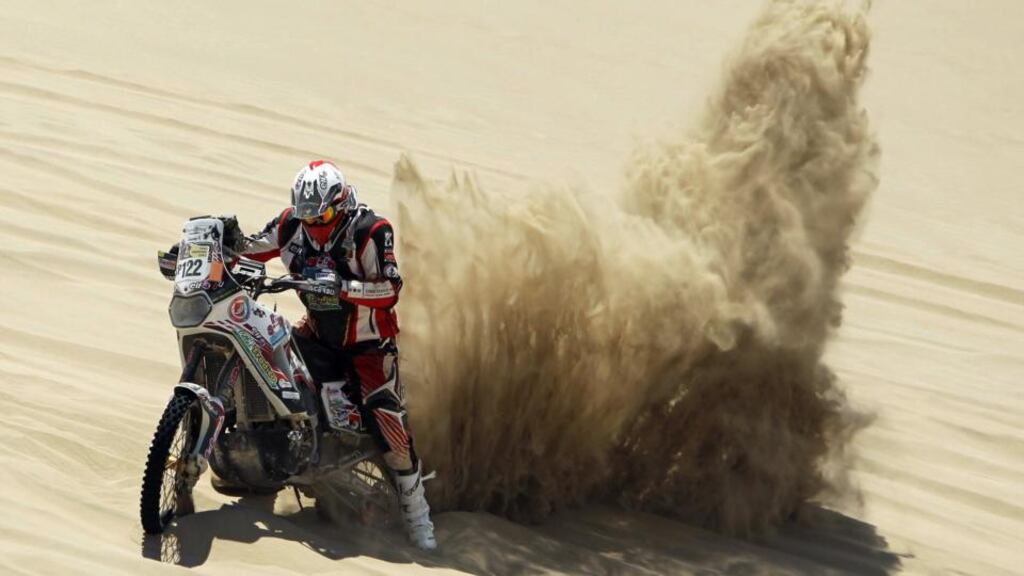 A file photo shows Belgian rider Eric Palante during the third stage of Dakar Rally 2013 . Photograph: Paolo Aguilar/EPA
