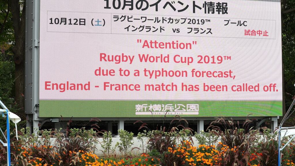 A sign outside of the Yokohama Stadium informs of the cancellation of the England v France game due to Typhoon Hagibis. Photo: Stu Forster/Getty Images