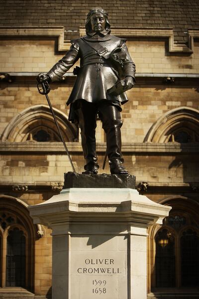 A statue of Oliver Cromwell stands outside Parliament in London.
