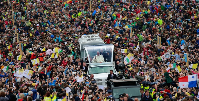 Pope Francis in the popemobile moving through the crowds in the Phoenix Park.  Photograph: Nick Bradshaw/The Irish Times