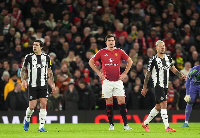 Manchester United's Harry Maguire (centre) after Newcastle's first goal in their 2-0 win at Old Trafford on Monday. Photograph: Martin Rickett/PA