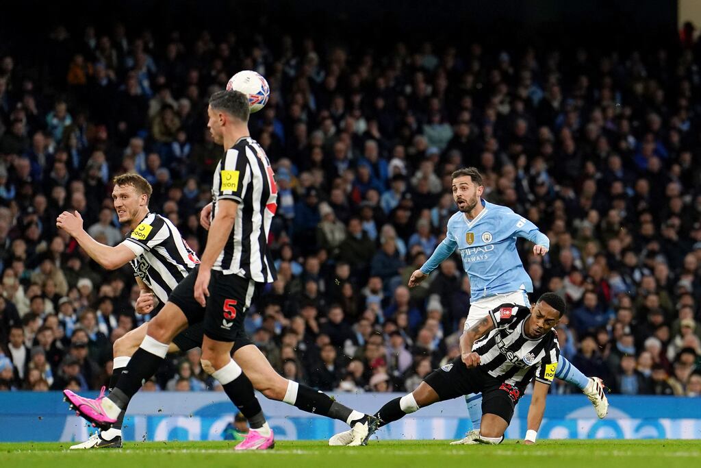 Manchester City's Bernardo Silva scores the opening goal against Newcastle. Photograph: Martin Rickett/PA Wire