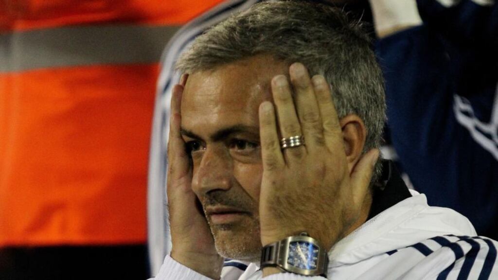 Chelsea manager Jose Mourinho reacts during the Capital One Cup, third round match at the County Ground, Swindon last night. Photo: David Davies/PA