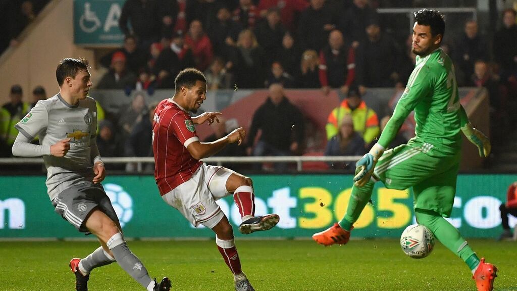 Korey Smith scores Bristol City’s winning goal in injury time to knock holders Manchester United out of the Carabao Cup at the quarter-final stage at Ashton Gate. Photograph: Dan Mullan/Getty Images