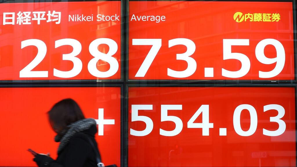 Share prices on the Tokyo Stock Exchange. Photograph: STR/Jiji Press/AFP via Getty