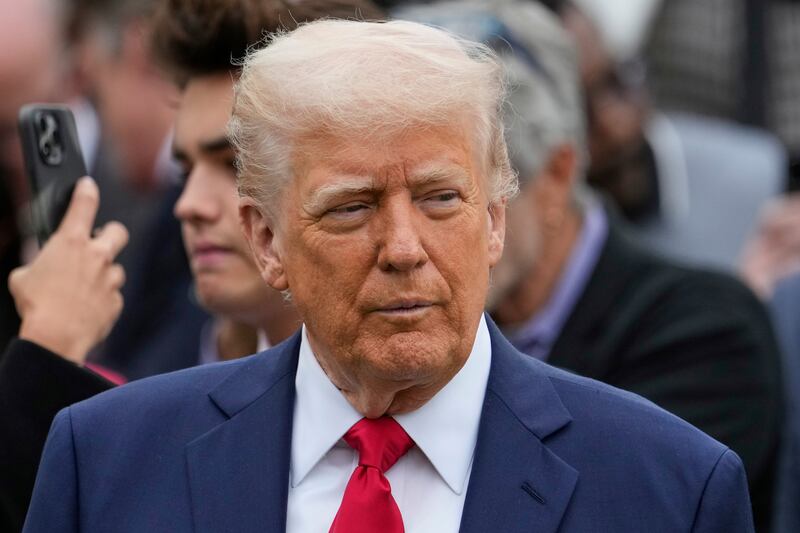 President Donald Trump watches during the White House Easter Egg Roll on the South Lawn of the White House. Photograph: Alex Brandon/AP