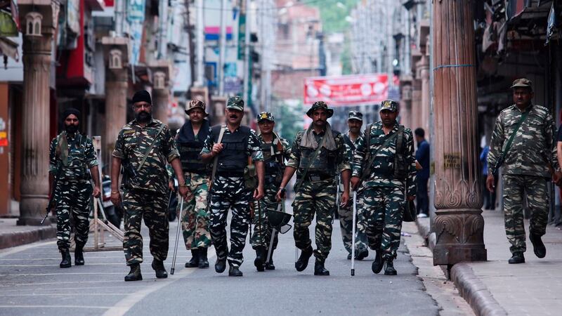 Security personnel patrol a street in Jammu in Kashmir on Tuesday. Photograph: Rakesh Bakshi/AFP/Getty Images
