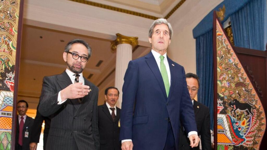 US secretary of state John Kerry arrives for a news conference with Indonesian foreign minister Marty Natalegawa (left) at the Pancasila building in Jakarta today. Photograph: Evan Vucci/Pool/Reuters.