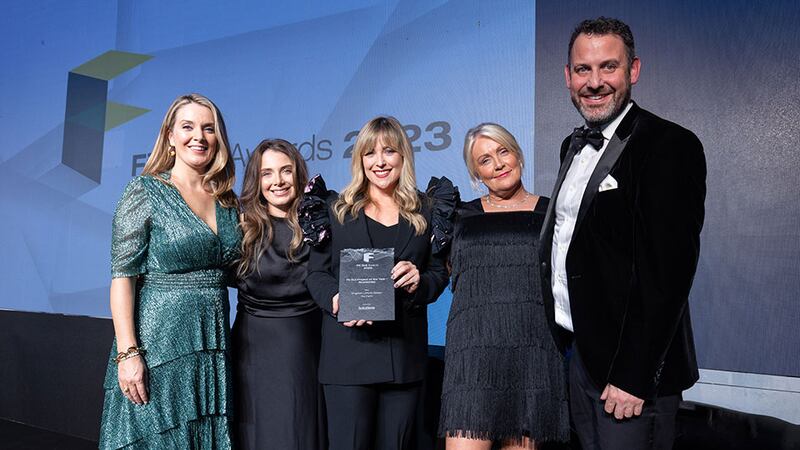 Ciara McNerney, general manager – power and steel at Solutions, presents the fit out project of the year – residential award to Kingston Lafferty Design and DMVF team