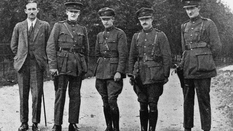 Michael Collins, Sinn Féin leader and commander-in-chief of the Irish Free State Army, at the Curragh Barracks in Co Kildare in July 1922, with Col Dunphy, Maj Gen Emmet Dalton, Comdt Gen P MacMahon and Comdt Gen D O’Hegarty. Photograph: Finnerty/Hulton Archive/Getty Images