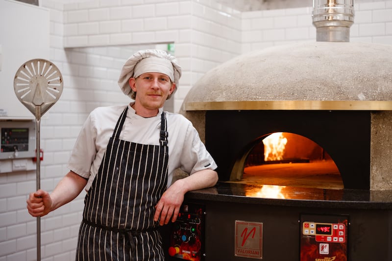 John Faulkner at the Valoriani pizza oven in the Pizza Shed at Killruddery.