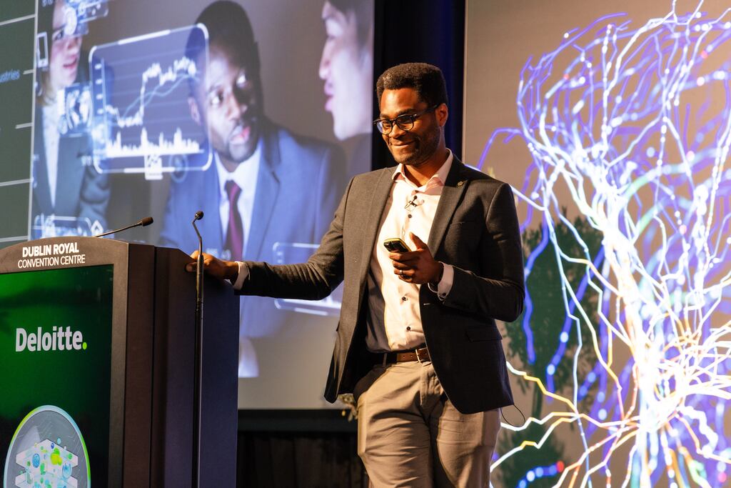 Emmanuel Adeleke, Deloitte Ireland consulting partner and GenAI lead, speaking at the company's Future of Corporate Reporting Conference in November 2023