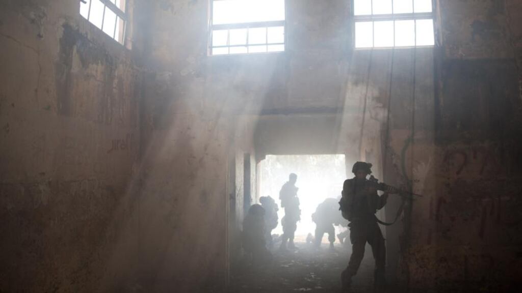 Israeli soldiers of the Golani brigade take part in an exercise near the border with Syria at the Israeli-annexed Golan Heights. Photograph: Uriel Sinai/Getty Images