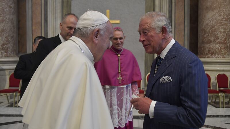 Pope Francis greeted by Charles, Prince of Wales following the canonisation mass for John Henry Newman. Photograph: Vatican Media/AFP