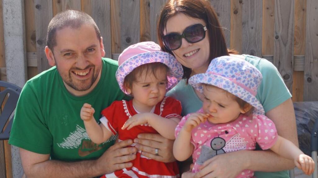 Paddy Healy with his wife Susan and twins Elise and Millie: Paddy realised he could apply wearable technology to a baby vest.