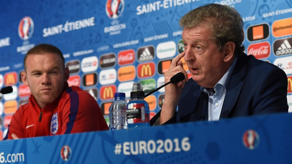 Roy Hodgson with England captain Wayne Rooney, who is likely to be rested for Monday night’s game against Slovakia in Saint-Étienne. Photograph: Afp