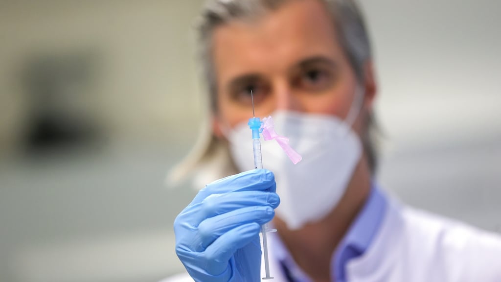 A doctor holds a syringe of Moderna vaccine against Covid-19 immediately before a vaccination at the University Hospital in Essen, Germany on January 18th. Photograph: EPA/FRIEDEMANN VOGEL
